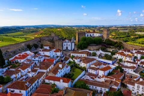 Aerial view of the historic walled town of Obidos at sunset, near Lisbon, Por Stock Photos