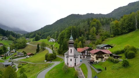 Aerial view of historic Wallfahrtskirche Maria Gern church under rain near .. Stock Footage 314528888