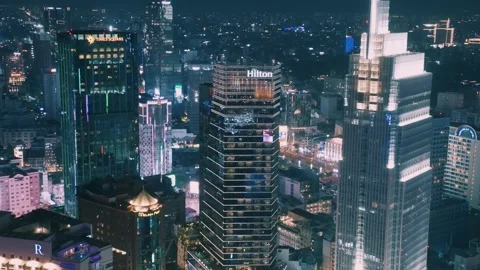 Aerial View of Ho Chi Minh City Night Skyline with River Boats Video stock 341095552