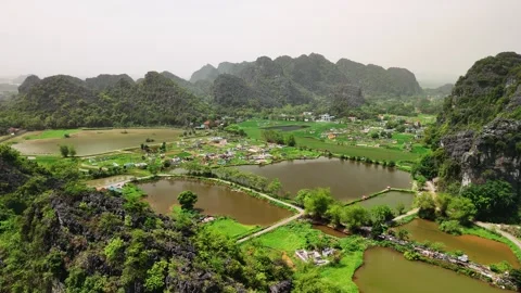 Aerial view of hoa lu ancient capital in ninh binh, with lush rice paddies,.. Stockbeeldmateriaal 335086870