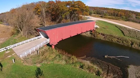 Aerial view of Hogback covered bridge in Fall colors Video stock 56403025