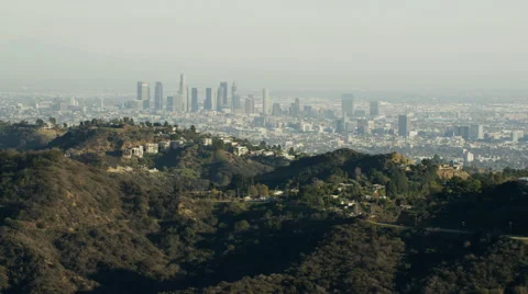 Aerial view from Hollywood Hills of Los Angeles city skyline California Stock Footage