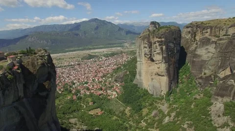 Aerial view of the Holy Trinity Monastery and Kalabaka, Meteora Stock Footage 66285548