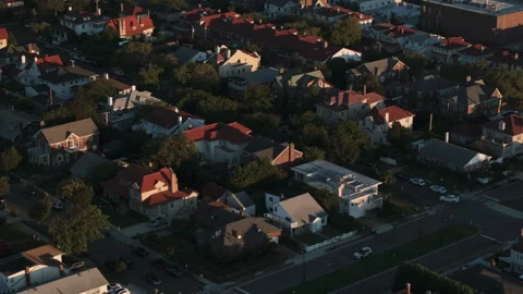 Aerial view of homes in Long Beach, New York at sunrise Видео 343968649