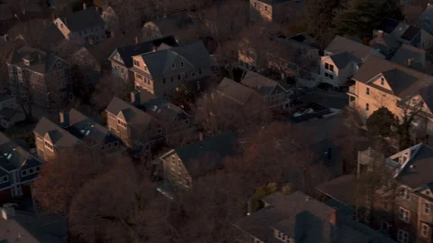 Aerial view of homes in Providence, Rhode Island at sunset Stock Footage 325490909