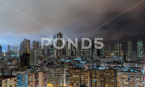 Aerial view of Hong Kong apartments in cityscape background. Residential dist Stock Photos