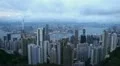 Aerial View of Hong Kong Island Skyline, Victoria Harbour, Kowloon Peninsula HD Footage