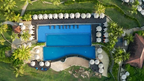 Aerial view of the hotel complex and swimming pool in the southern part of the Stock Footage 103054561