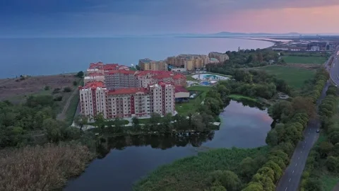 Aerial view to hotel complex on the Black Sea near a river Stock Footage 287913376