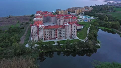 Aerial view to hotel complex on the Black Sea near a river 스톡 동영상 287986011