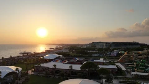 Aerial view of hotels at the beach by sunset time Stock Footage 336629216