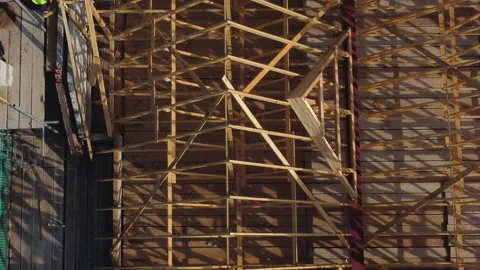 Aerial View Of House Being Built With Bricklayers Laying Stock Footage 239757802