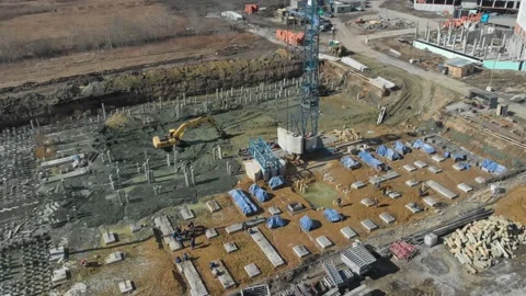 Aerial view of house building process at construction site at sunny day Stockbeeldmateriaal 144284790