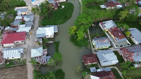 Aerial view of the house by the river Stock Footage 248372787