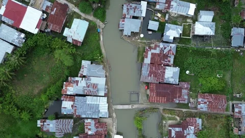 Aerial view of the house by the river Stock Footage 252107183