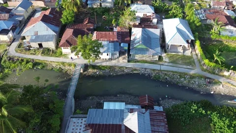 Aerial view of the house by the river Stock Footage 252108098