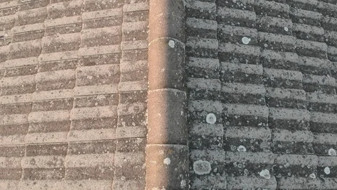 Aerial view of house rooftop checking roof tiles Vídeo Stock 122344879