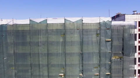 Aerial view of a house under construction works. Unfinished brick building Stock Footage 130319033
