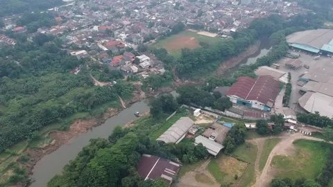 An aerial view of housing complex next to a river Stock Footage 150412857