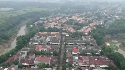 An aerial view of housing complex next to a river Stock Footage 150417561