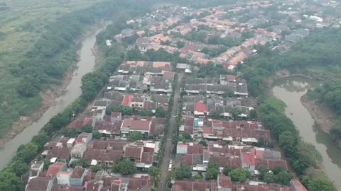 An aerial view of housing complex next to a river Stock Footage 150417693