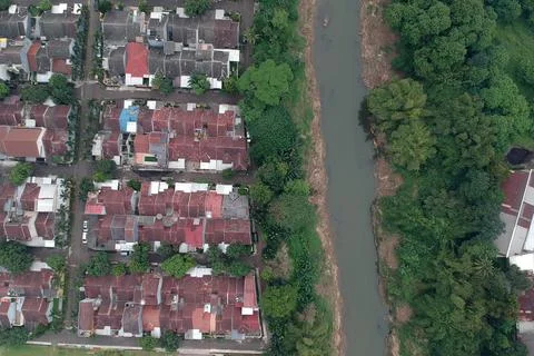 An aerial view of housing complex next a river Stock Photos