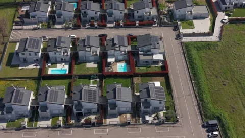Aerial view housing development in northern Italy with photovoltaic panels Stock Footage 341052833
