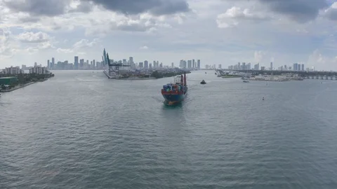 Aerial view how to Cargo ship leaves port Miami Stock Footage 121066555
