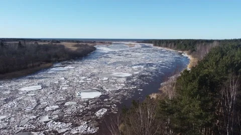 Aerial view of a huge blocks of pack ice going down the river to the sea Stock Footage 149819157