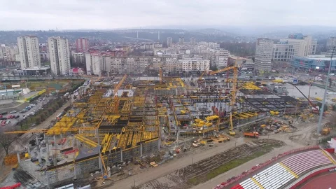 Aerial view on huge construction site with heavy equipment and workers. Stock Footage 88791753