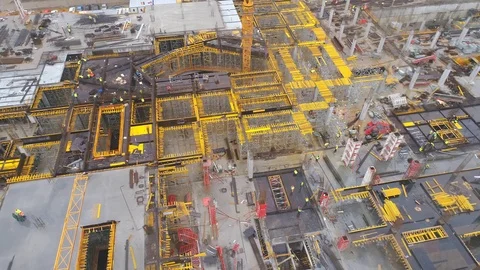 Aerial view on huge construction site with heavy equipment and workers. Stock Footage 88792144