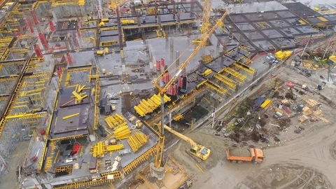 Aerial view on huge construction site with heavy equipment and workers. Stock Footage 88792286