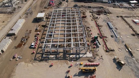 Aerial view on huge construction site with heavy equipment and workers. Stock Footage 295235041