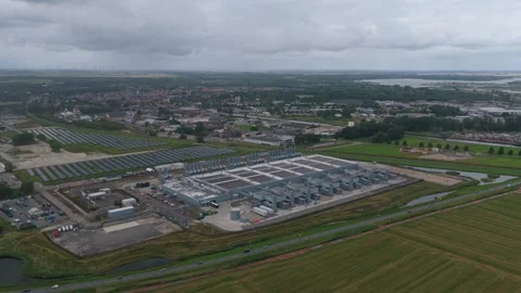 Aerial view of a huge data center and solar panel farm in the netherlands Stock Footage 340352721