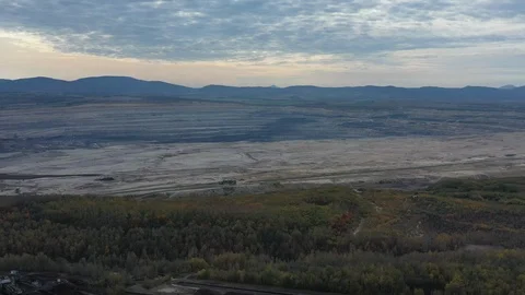 Aerial view of huge open pit brown coal mine (lignite coal quarry) - Poland Stock Footage 119692658