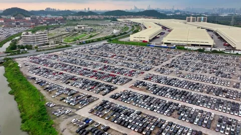 Aerial view huge parking lot. Many cars for sale. Factory auto dealerships salon Video stock 327727770