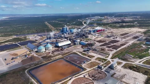 Aerial view of a huge pulp and paper mill industry Stock Footage 339674211