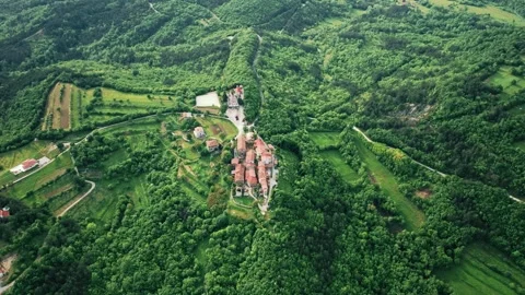 Aerial view of Hum, one of the smallest town in the world on hilltop, Croatia. Stock Footage 260422019