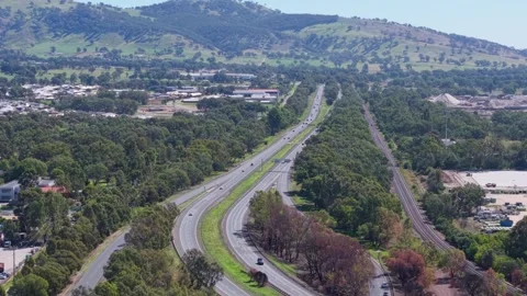 Aerial view of Hume Freeway and rail corridor near Wodonga Victoria Stock Footage 334923849