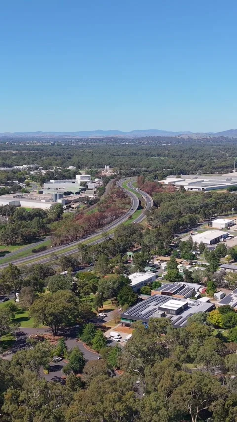 Aerial view of Hume Freeway and rail corridor near Wodonga Victoria Stock Footage 335002140