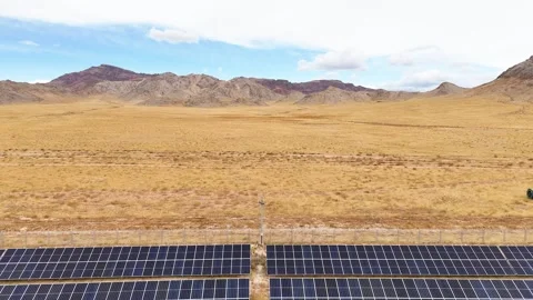 Aerial view of hundreds of solar panels in Uliastai desert, Mongolia. The Stock Footage 288029085