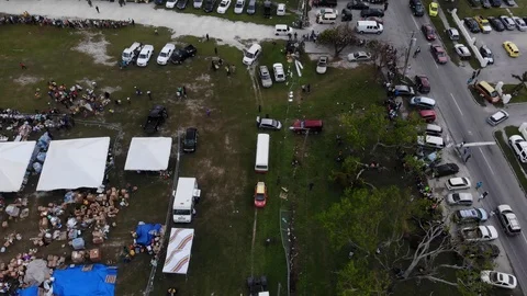 Aerial View of Hurricane Dorian Relief Food Giveaway in Freeport, Bahamas Stock Footage 117912910