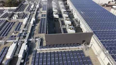 Aerial view of hvac system and solar panels on building rooftop Stock-Footage 339304200
