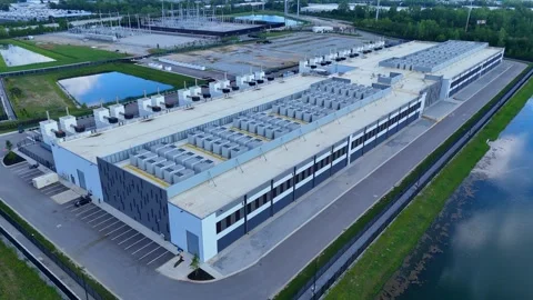 Aerial view of a hyperscale data center building and its infrastructure in Stock Footage 345670334