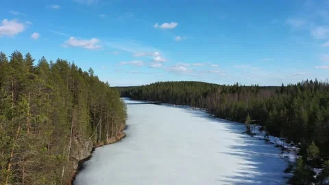 Aerial view of ice-covered Kallio lake Finland. 動画素材 138435524