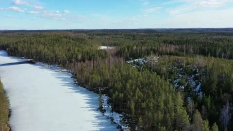 Aerial view of ice-covered Kallio lake Finland. 動画素材 138435971