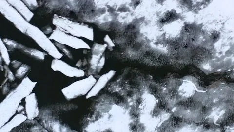 Aerial view of the ice on the river. Ice drift Stock Footage 105836640