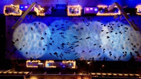 Aerial view of ice skating rink in Montreal with colorful lights and winter Stock Footage 346759227
