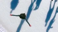 Aerial View Of Ice Skating Woman Outdoor, Ice Rink Medeo Stock Footage