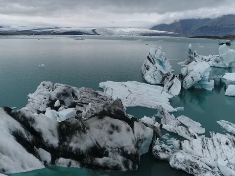 Aerial view of icebergs and formations in Jokulsarlon Glacier Lagoon river Stock-Footage 80621225
